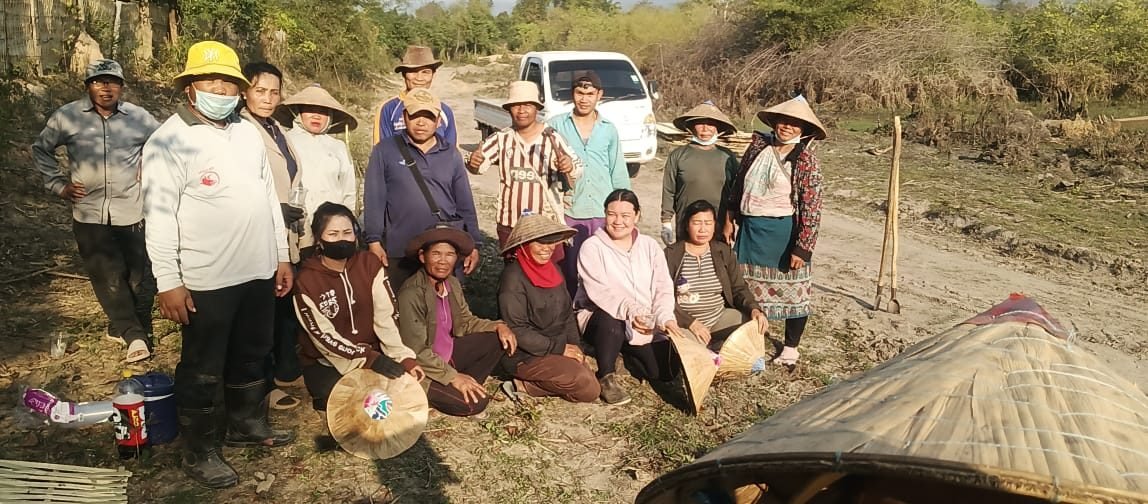 Villagers learning cultivation techniques in the field